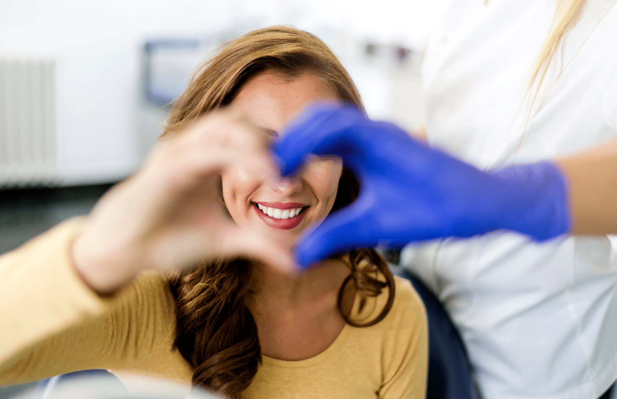 patient and dentist showing love in Pacific Northwest Smiles at Mill Creek